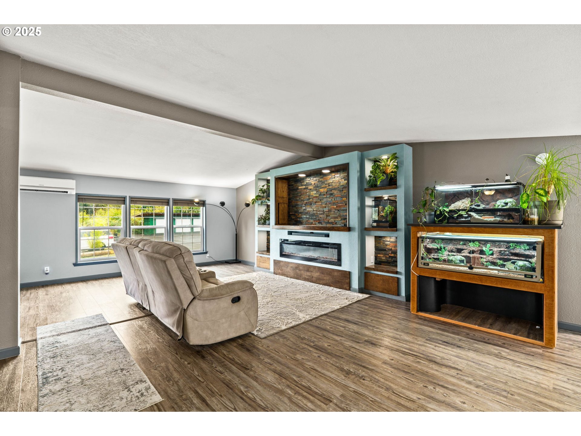 37495 Parsons Creek Road Springfield, OR 97478 - Photo 6 of 47 a living room with furniture and a flat screen tv