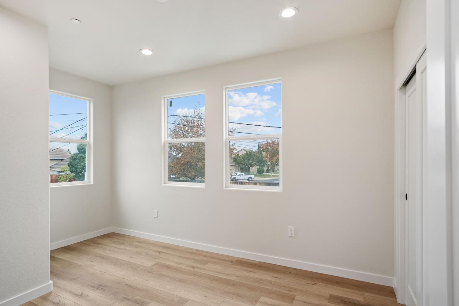 243 East E 3rd Street Tracy, CA 95376 - Photo 11 of 29 an empty room with windows