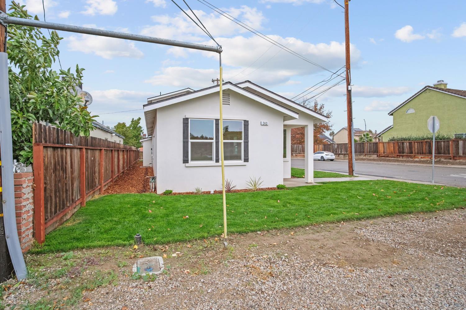 243 East E 3rd Street Tracy, CA 95376 - Photo 4 of 29 a house view with a outdoor space