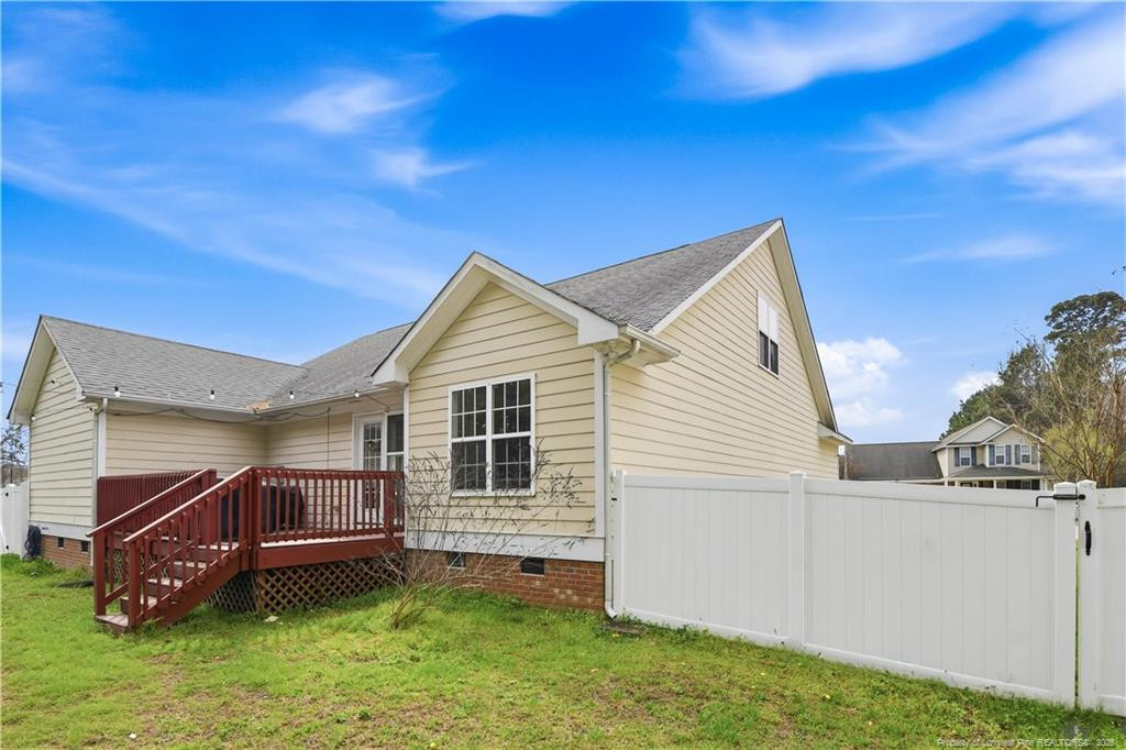 212 Lennox Loop Raeford, NC 28376 - Photo 43 of 47 a view of a house with a yard