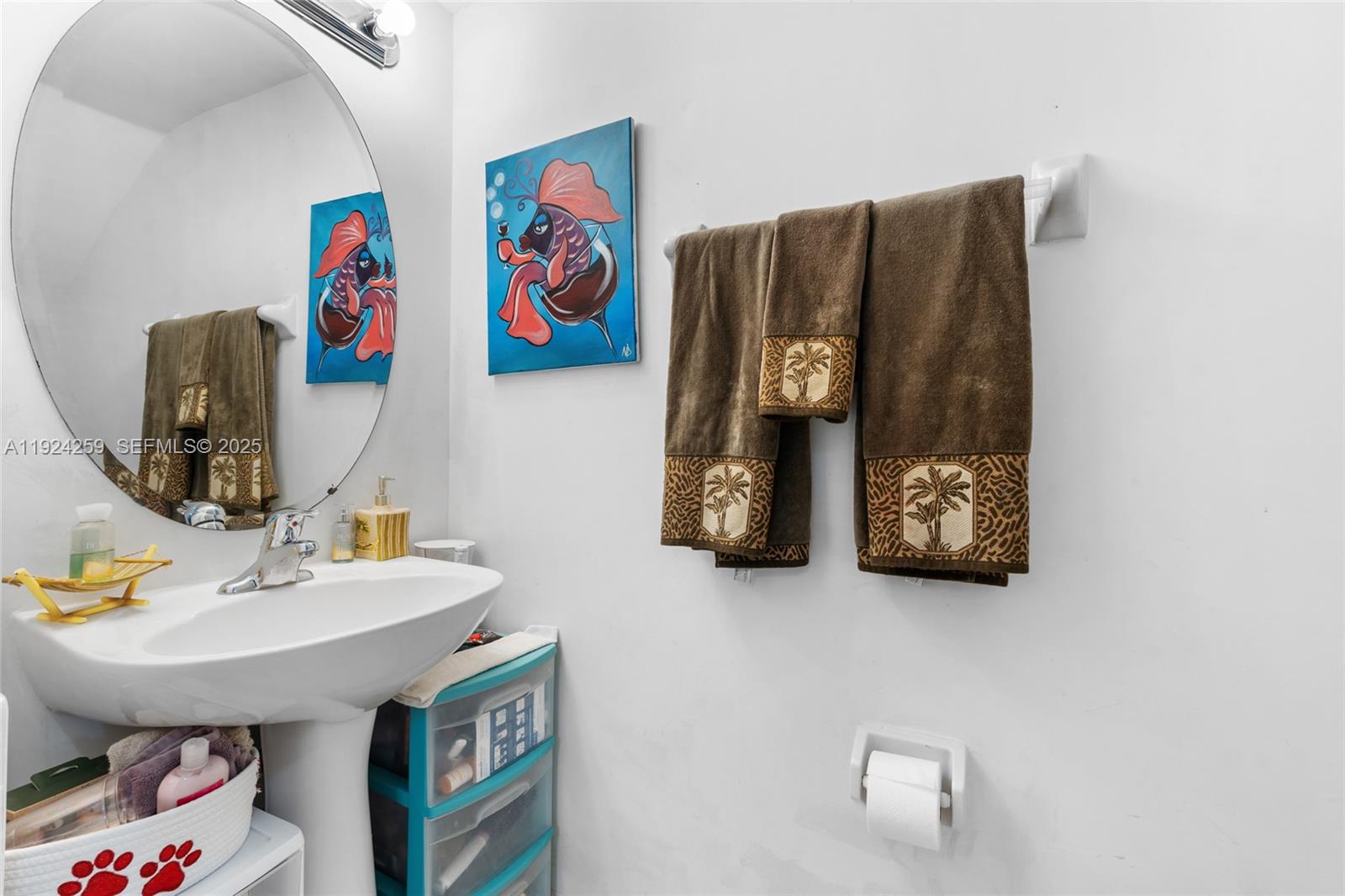230 Southeast 29th Avenue, Unit 12 Homestead, FL 33033 - Photo 12 of 29 a bathroom with a sink and a mirror