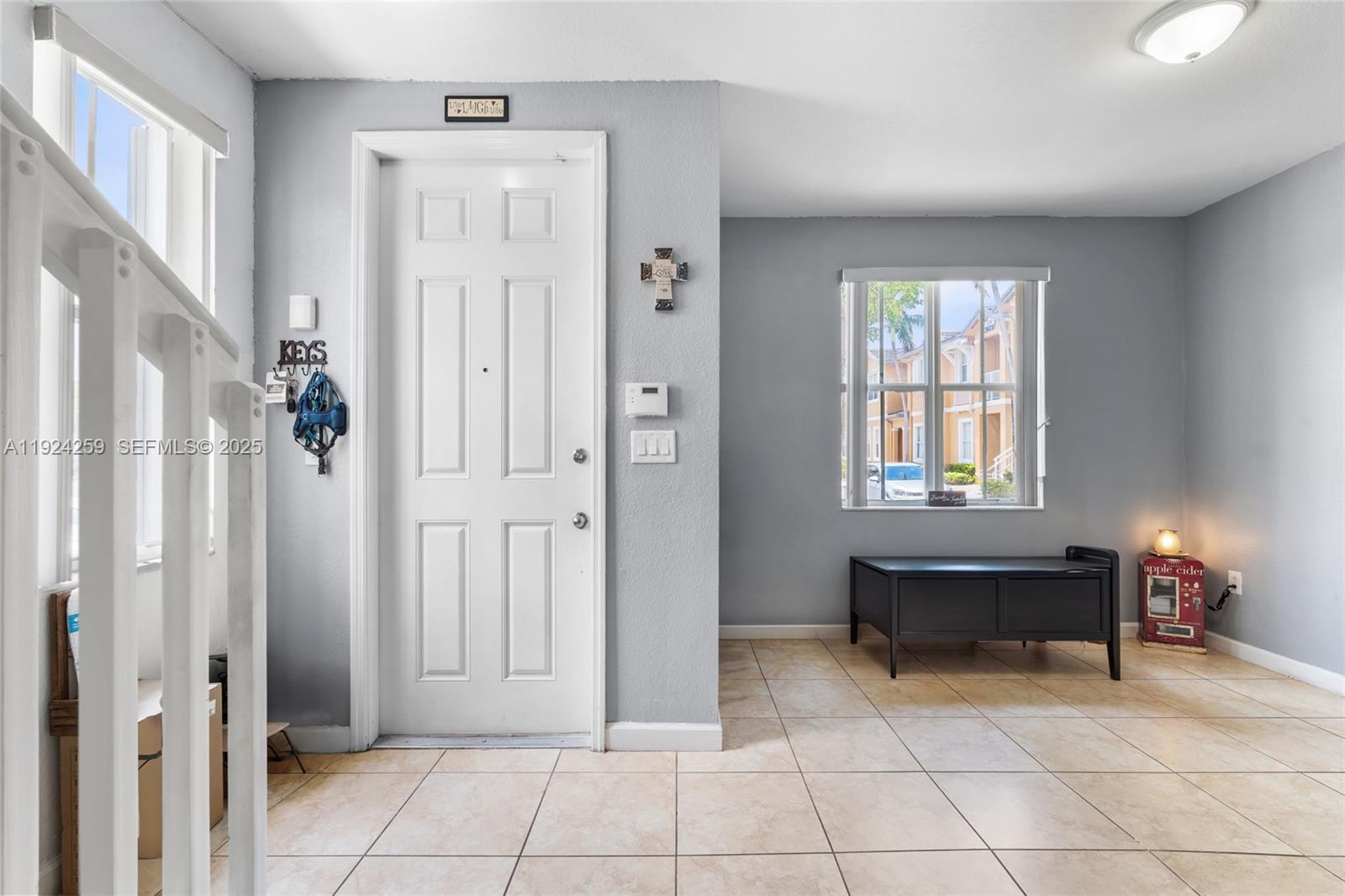 230 Southeast 29th Avenue, Unit 12 Homestead, FL 33033 - Photo 2 of 29 a view of an entryway with a livingroom