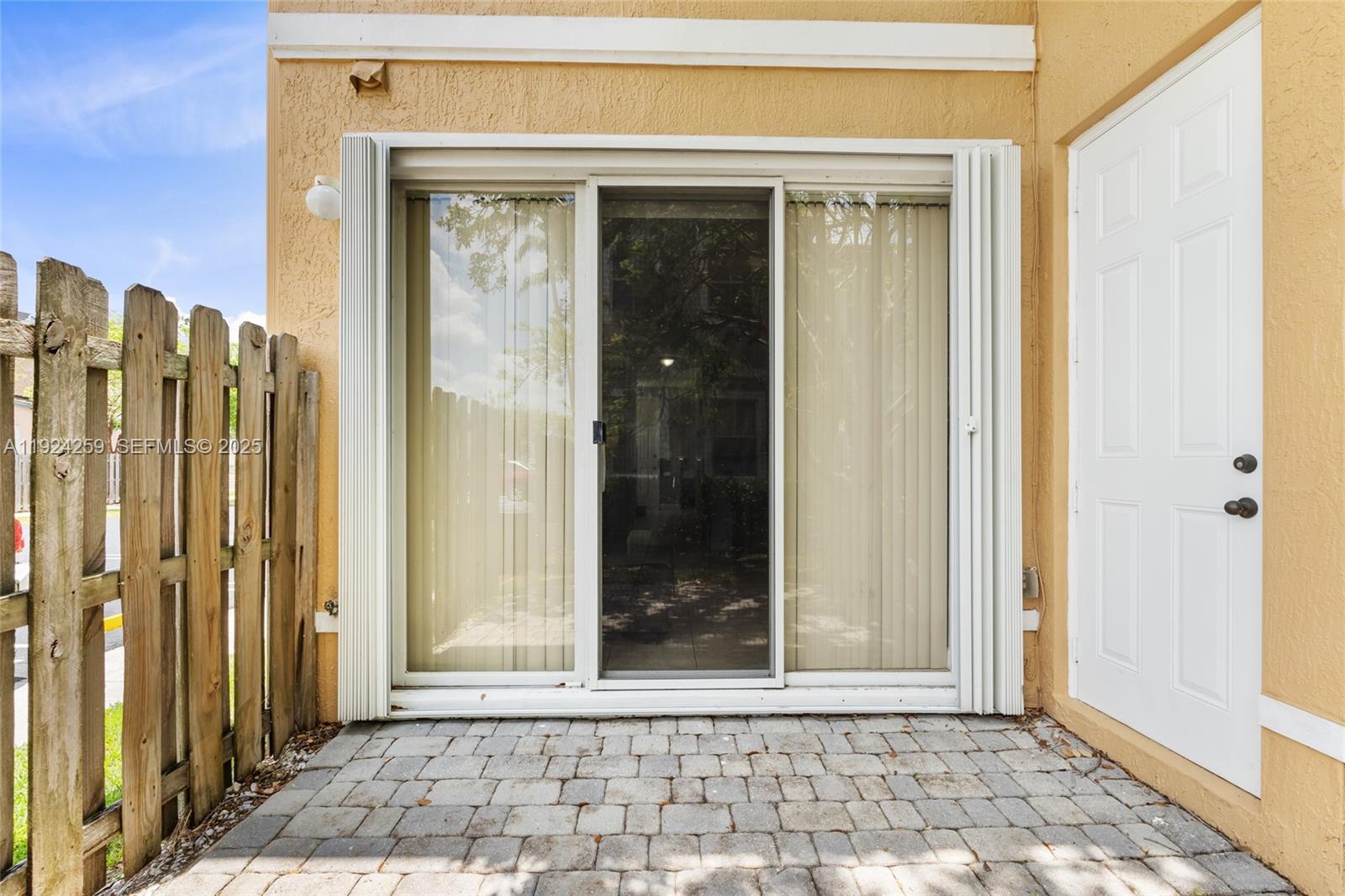230 Southeast 29th Avenue, Unit 12 Homestead, FL 33033 - Photo 21 of 29 a view of a entryway door of the house