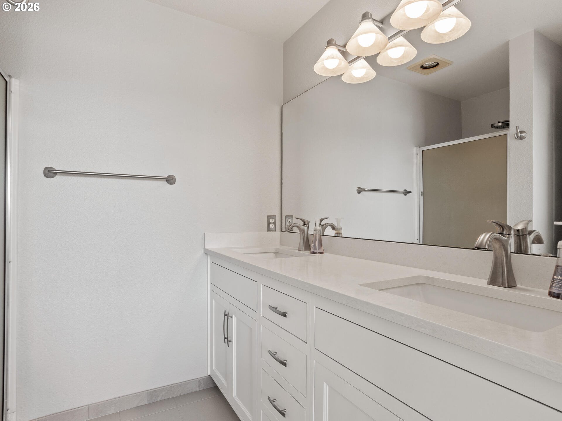 758 Southeast Fairwinds Loop Vancouver, WA 98661 - Photo 16 of 30 a bathroom with a sink vanity and a mirror