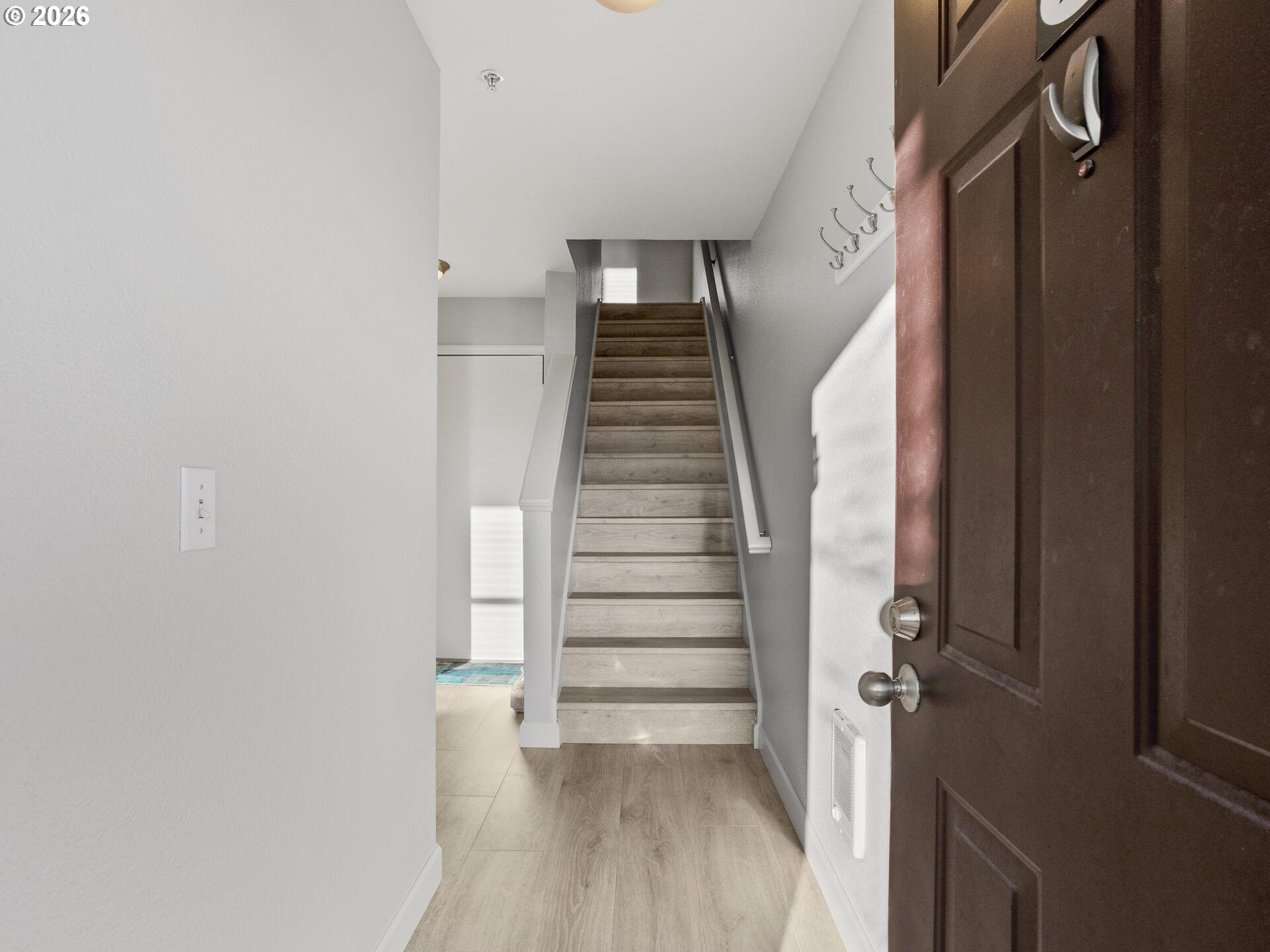 758 Southeast Fairwinds Loop Vancouver, WA 98661 - Photo 3 of 30 a view of entryway with stairs and wooden floor