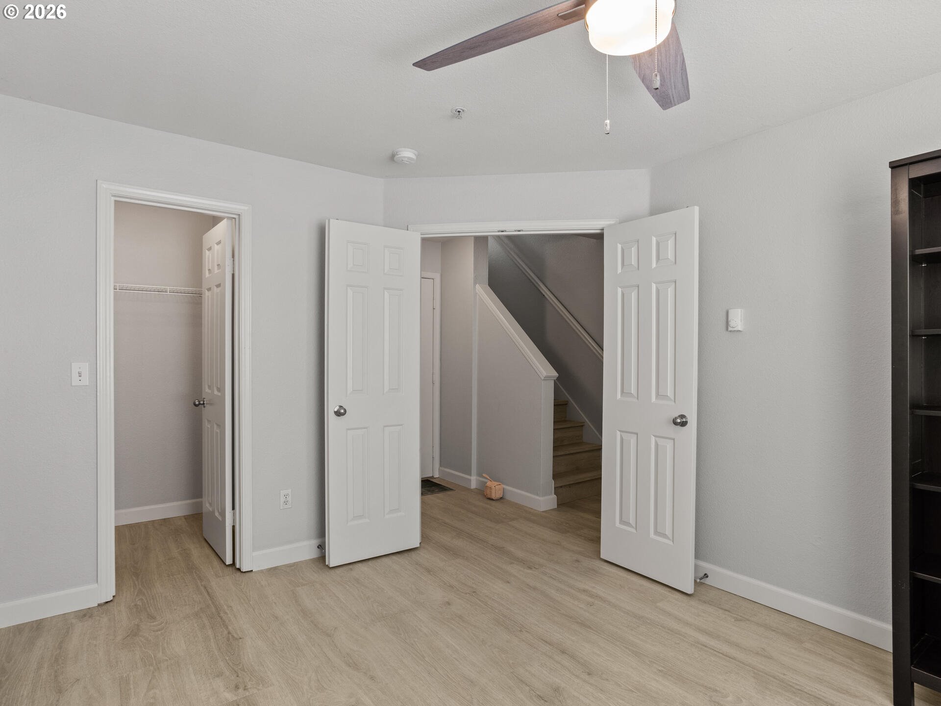 758 Southeast Fairwinds Loop Vancouver, WA 98661 - Photo 4 of 30 a view of a room with wooden floor and stairs