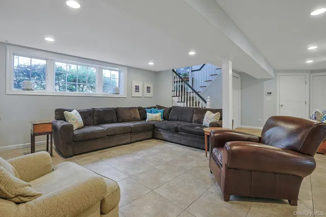 a view of a room with gym equipment and a large window