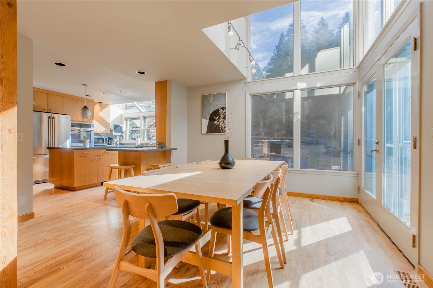 123 Hiline Road Bellingham, WA 98229 - Photo 11 of 40 a view of a dining room with furniture window and wooden floor