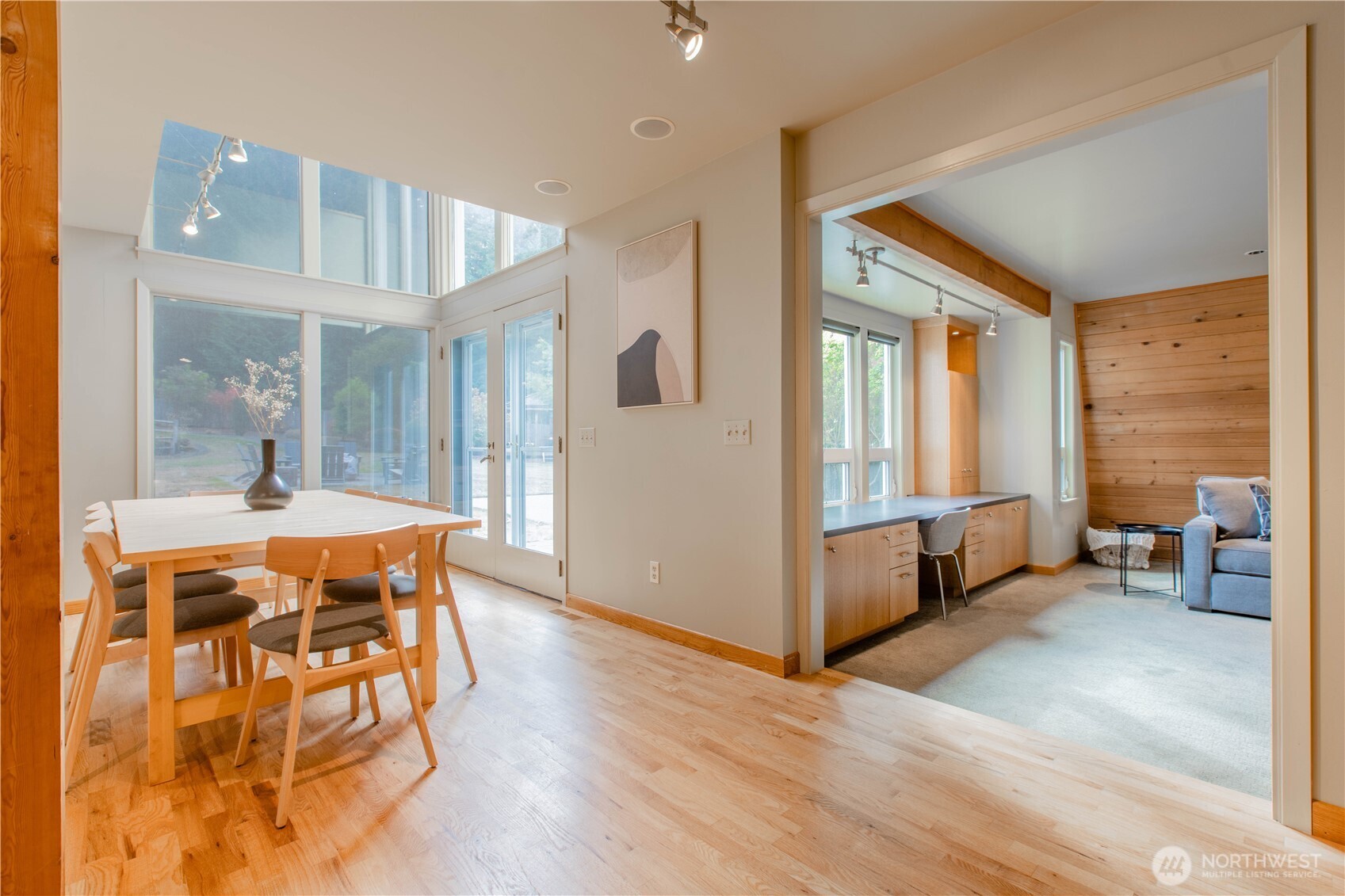 123 Hiline Road Bellingham, WA 98229 - Photo 12 of 40 a spacious bedroom with a large bed and a chandelier