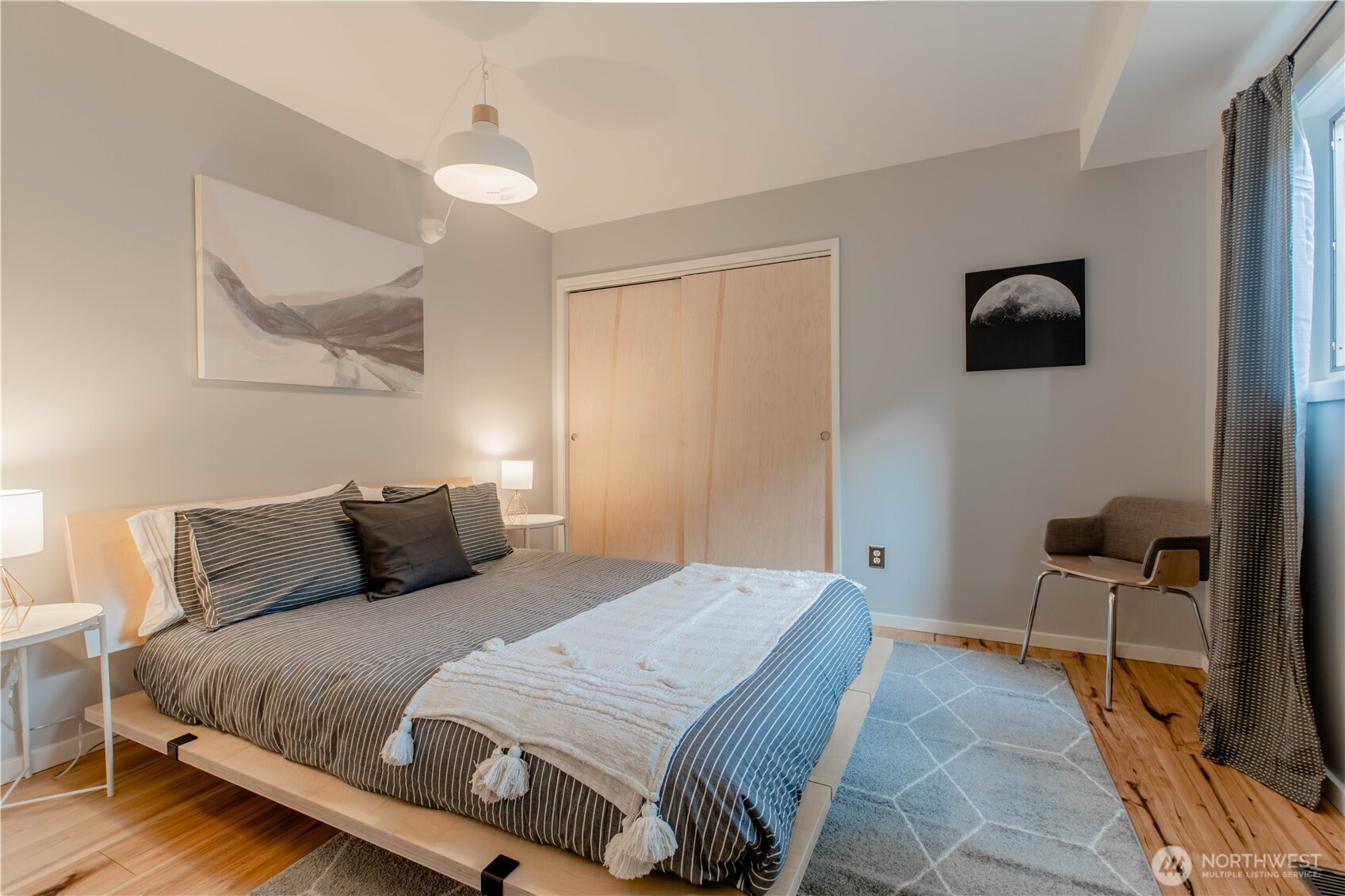 123 Hiline Road Bellingham, WA 98229 - Photo 18 of 40 a bedroom with a bed and a chair