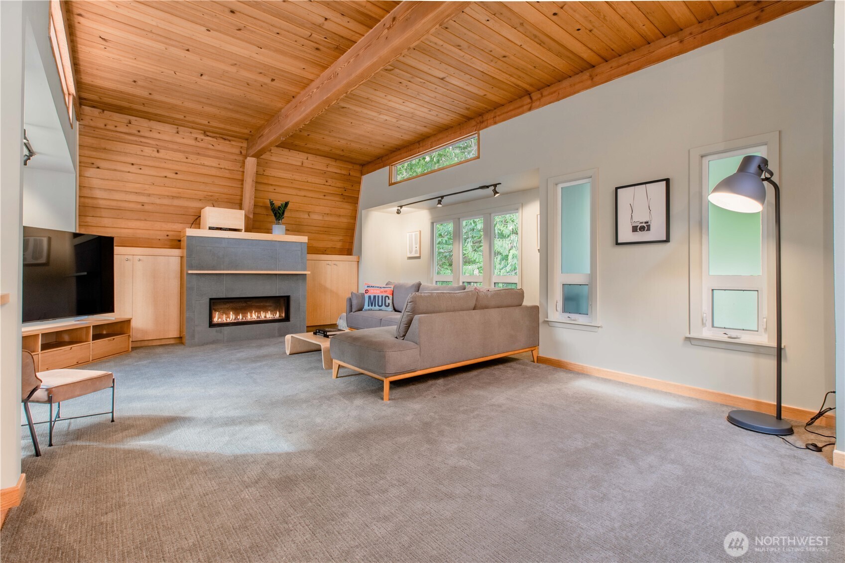 123 Hiline Road Bellingham, WA 98229 - Photo 19 of 40 a living room with furniture and a flat screen tv