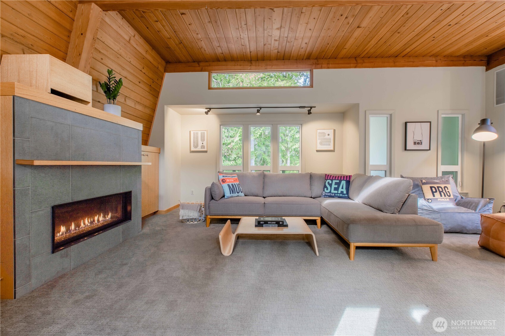 123 Hiline Road Bellingham, WA 98229 - Photo 21 of 40 a living room with furniture and a fireplace