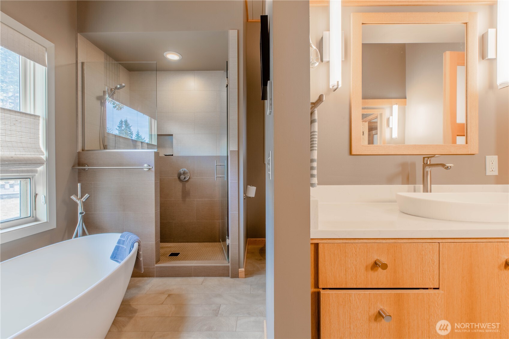 123 Hiline Road Bellingham, WA 98229 - Photo 22 of 40 a bathroom with a granite countertop sink a mirror and a bathtub