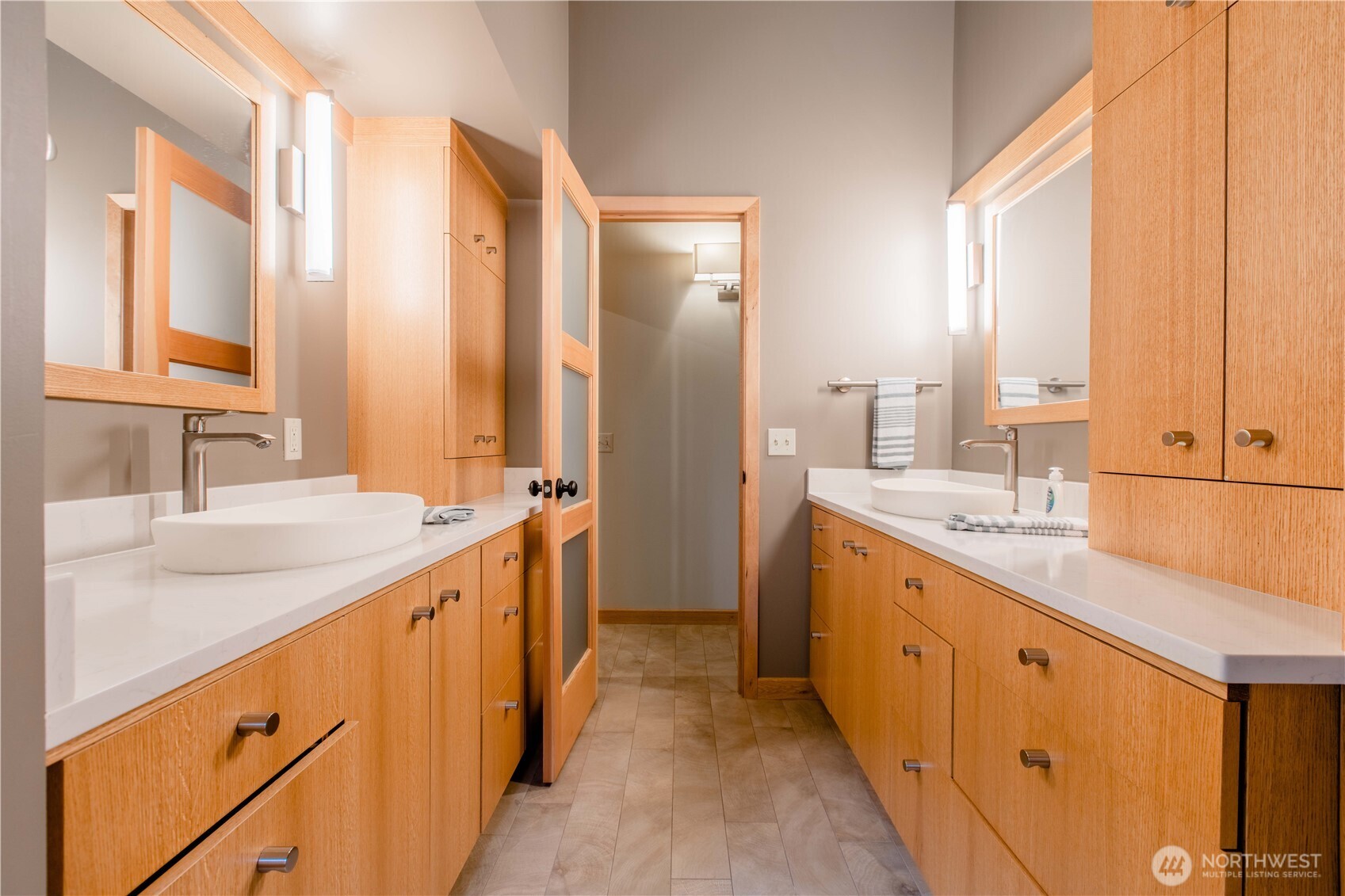 123 Hiline Road Bellingham, WA 98229 - Photo 23 of 40 a large bathroom with a double vanity sink and mirror with shower