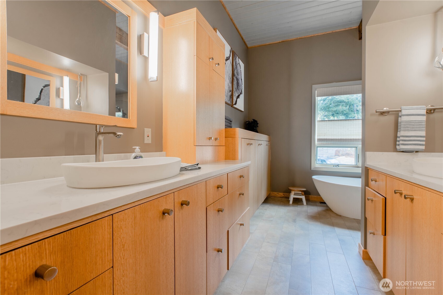 123 Hiline Road Bellingham, WA 98229 - Photo 25 of 40 a bathroom with a granite countertop sink a mirror and a bathtub