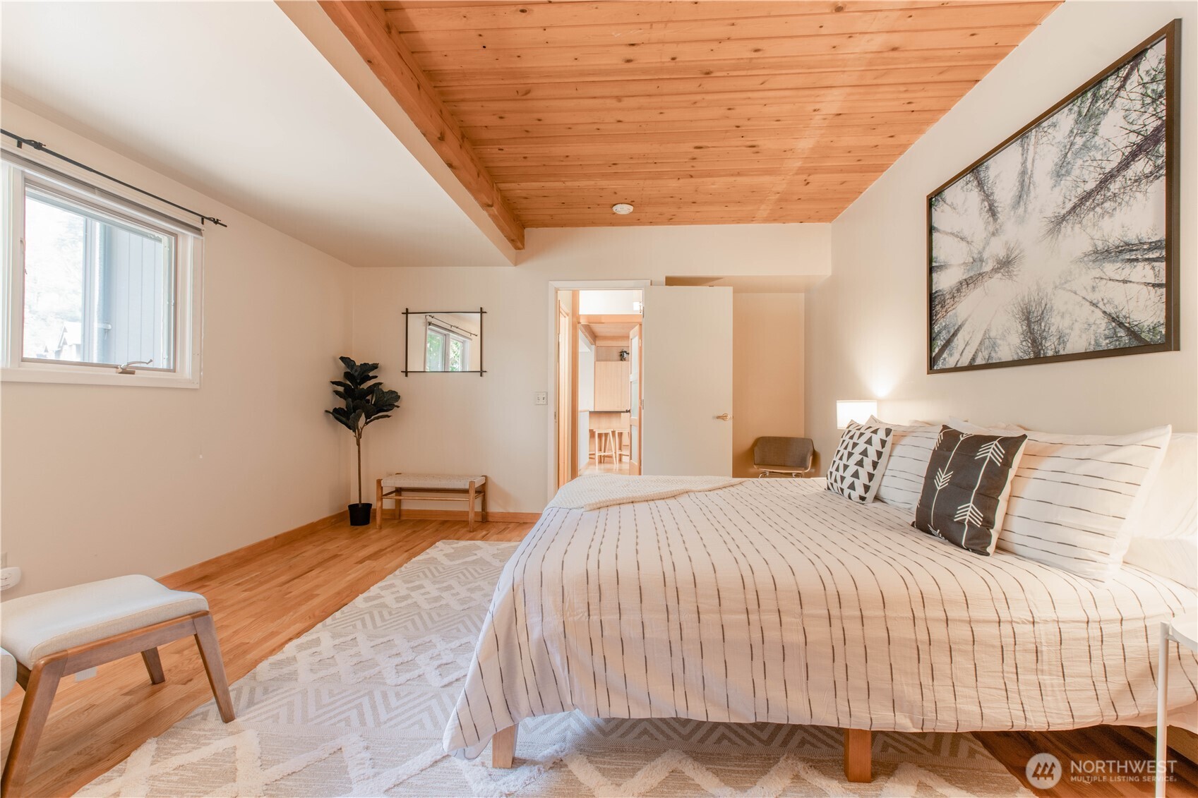 123 Hiline Road Bellingham, WA 98229 - Photo 28 of 40 a bedroom with a bed and a painting on the wall