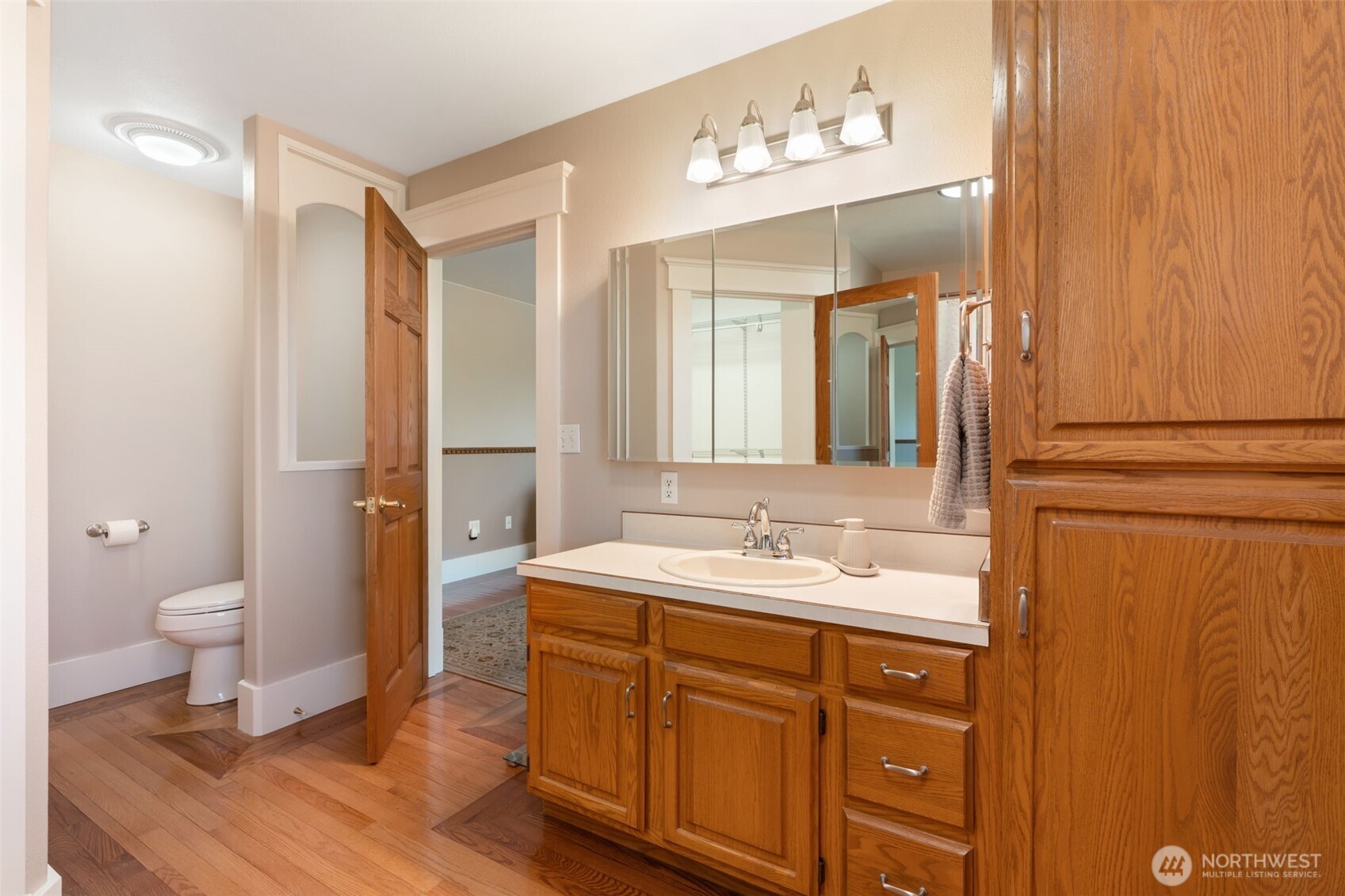 308 Brockway Road Chehalis, WA 98532 - Photo 20 of 40 a spacious bathroom with a double vanity sink toilet and a mirror