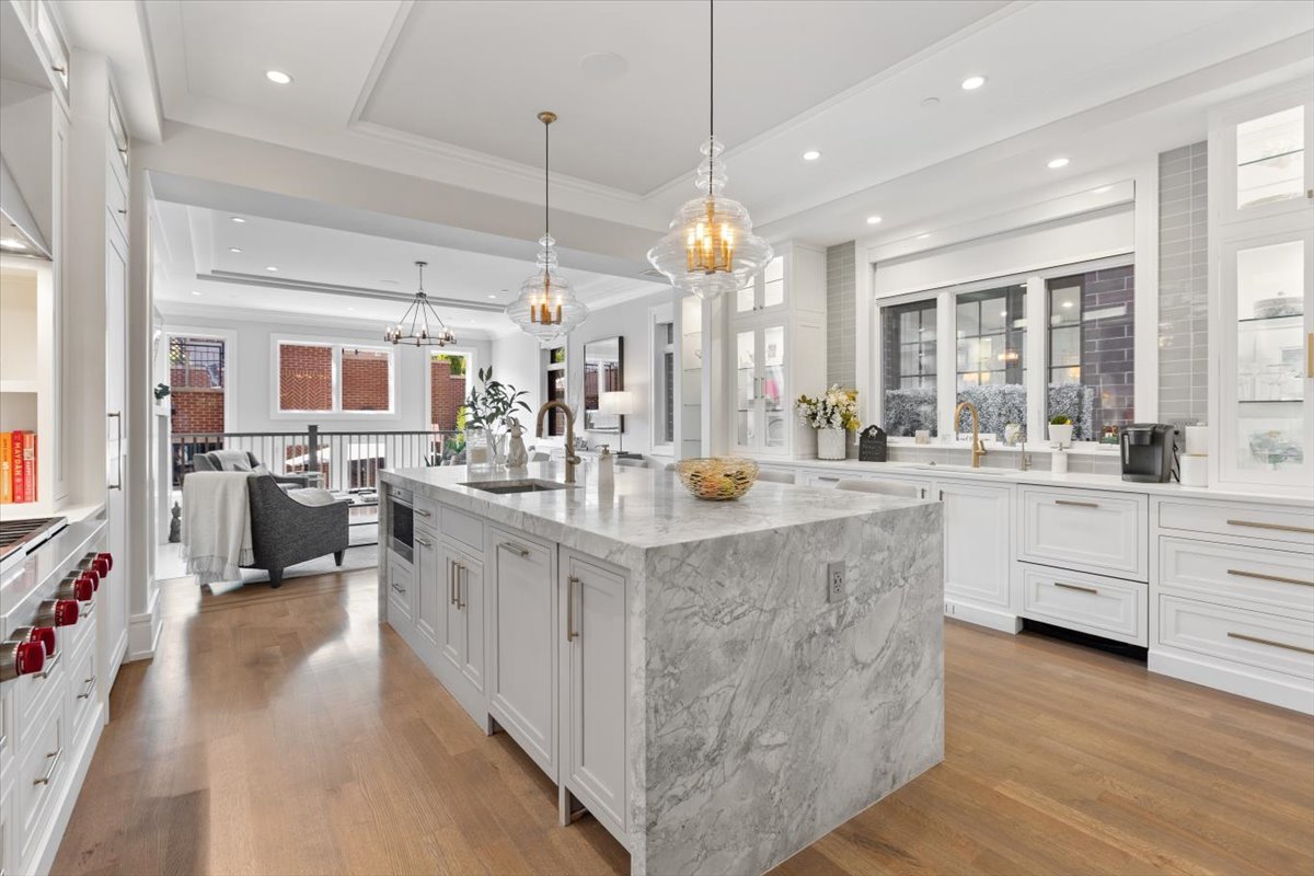 2138 North Seminary Avenue Chicago, IL 60614 - Photo 16 of 76 a kitchen with stainless steel appliances kitchen island a large counter top a sink a stove and a refrigerator