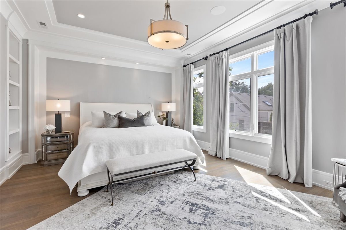 2138 North Seminary Avenue Chicago, IL 60614 - Photo 31 of 76 a bedroom with a bed lamp and a large window