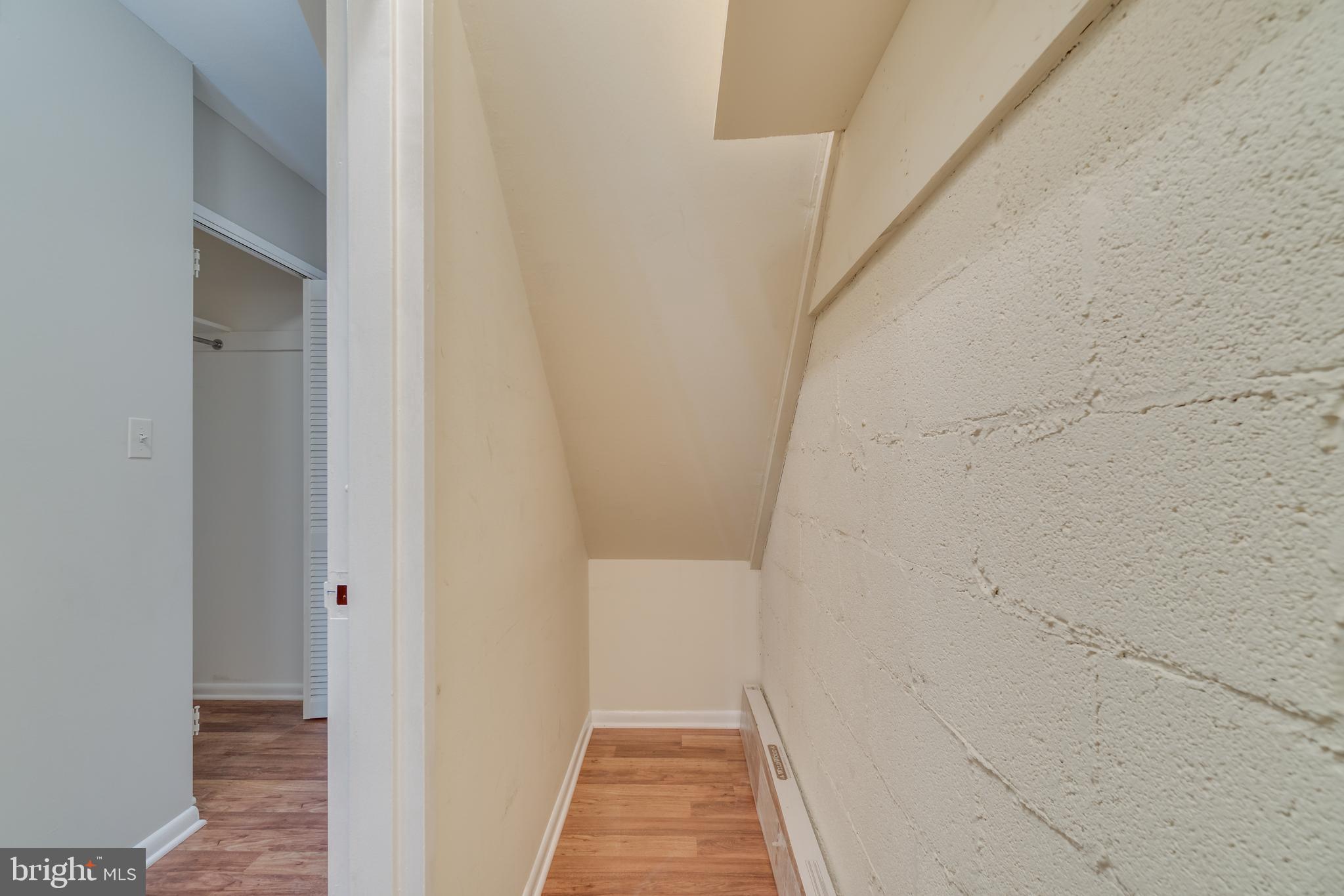 257 G Street Southwest, Unit 110 Washington, DC 20024 - Photo 20 of 33 Hall closet under stairs