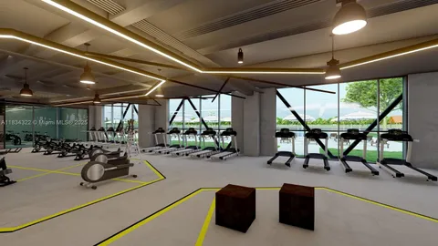 a view of a gym with trees in the background