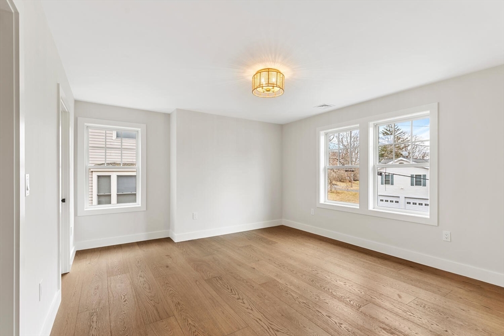16 Estabrook Road Lexington, MA 02421 - Photo 28 of 38 an empty room with a window