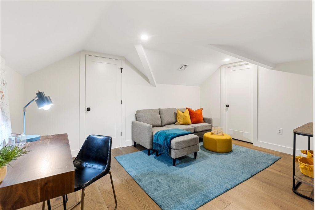 16 Estabrook Road Lexington, MA 02421 - Photo 33 of 38 a living room with furniture and wooden floor