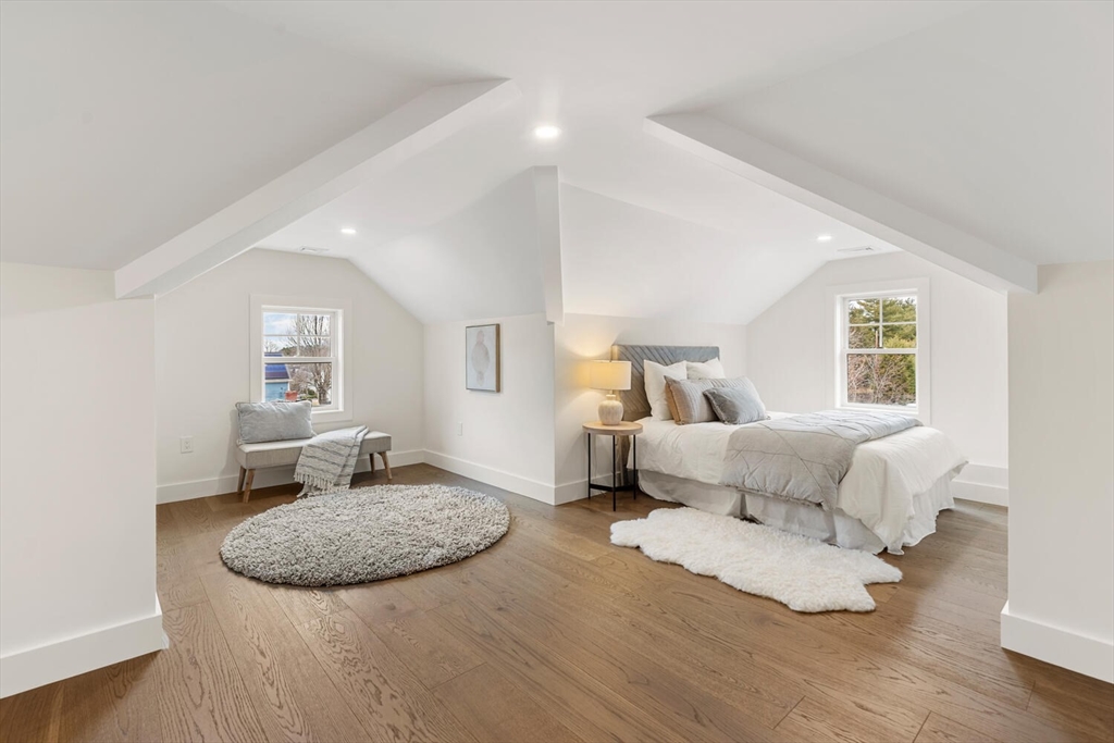 16 Estabrook Road Lexington, MA 02421 - Photo 36 of 38 a bedroom with a bed and wooden floor