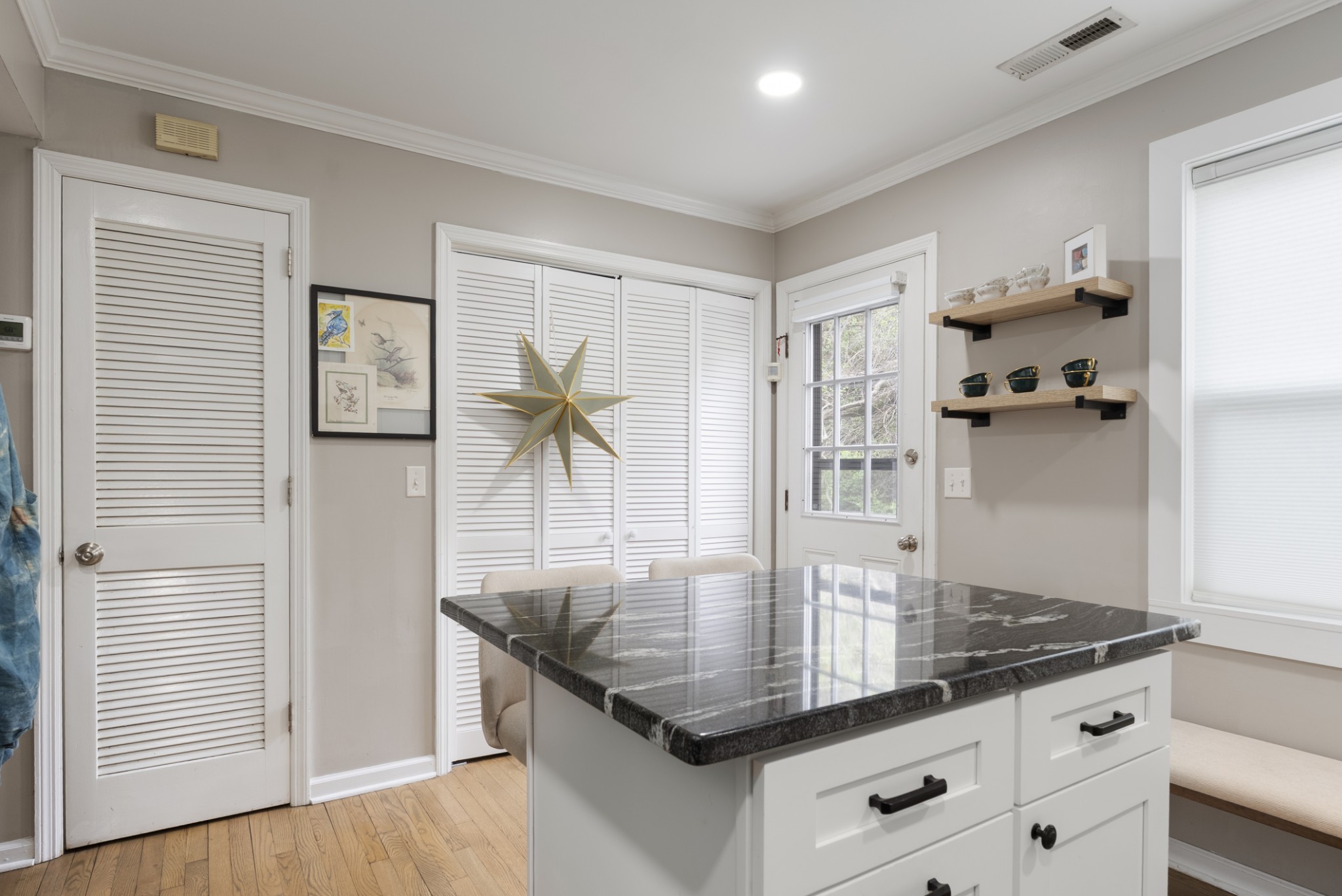 741 Fox Ridge Drive Brentwood, TN 37027 - Photo 12 of 38 a kitchen with granite countertop a table and chairs in it