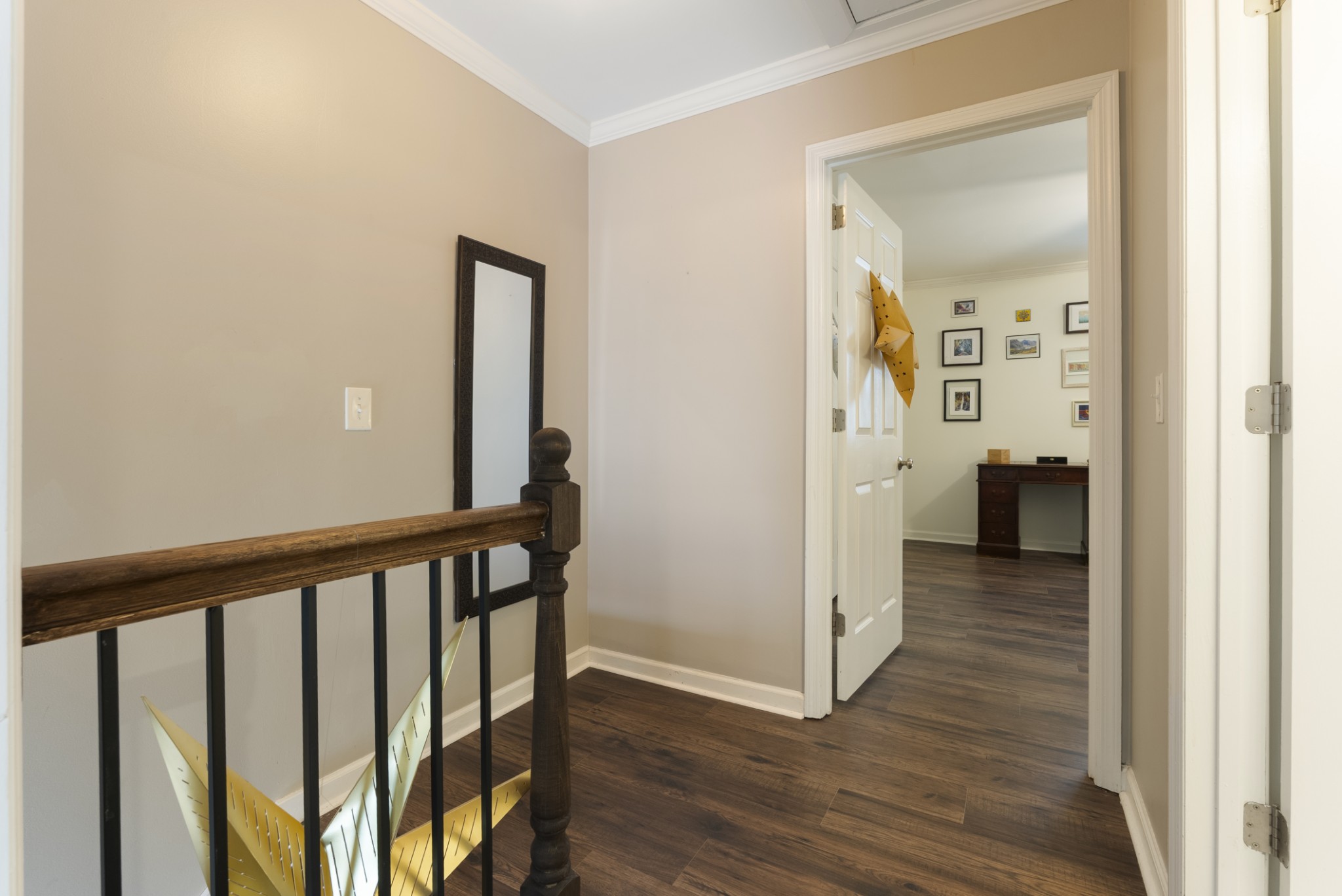 741 Fox Ridge Drive Brentwood, TN 37027 - Photo 23 of 38 a view of a hallway with wooden floor and a living room