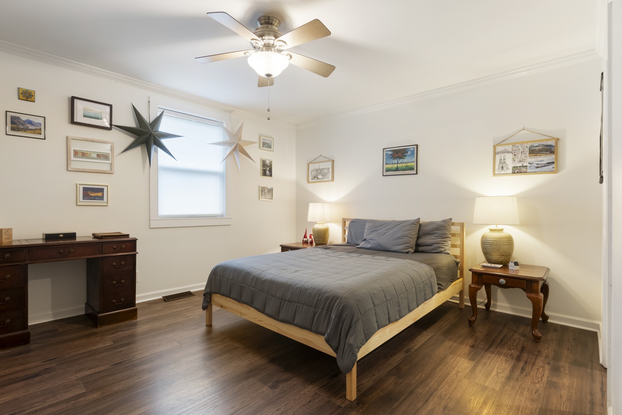 741 Fox Ridge Drive Brentwood, TN 37027 - Photo 25 of 38 a bedroom with a bed and wooden floor