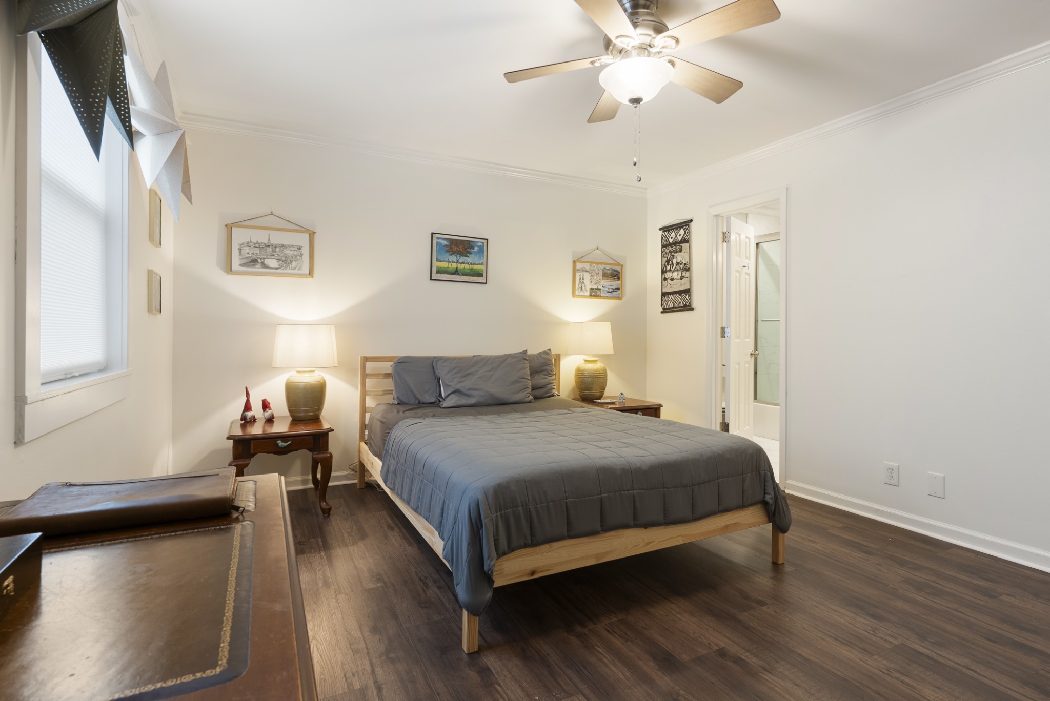 741 Fox Ridge Drive Brentwood, TN 37027 - Photo 26 of 38 a bedroom with a bed and wooden floor