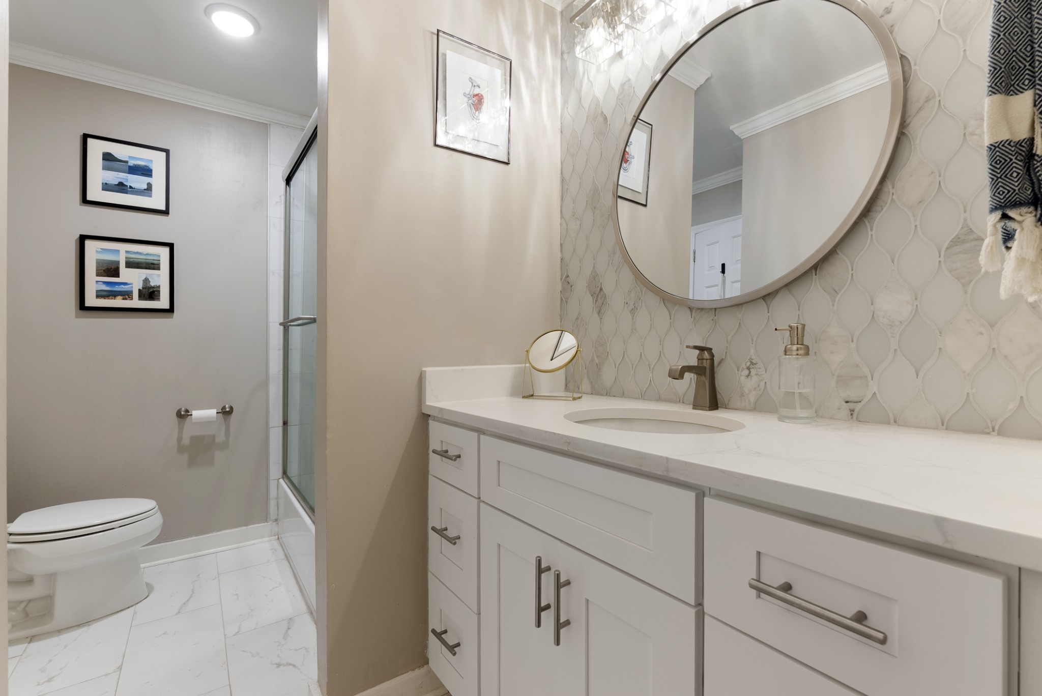741 Fox Ridge Drive Brentwood, TN 37027 - Photo 27 of 38 a bathroom with a toilet a sink and mirror