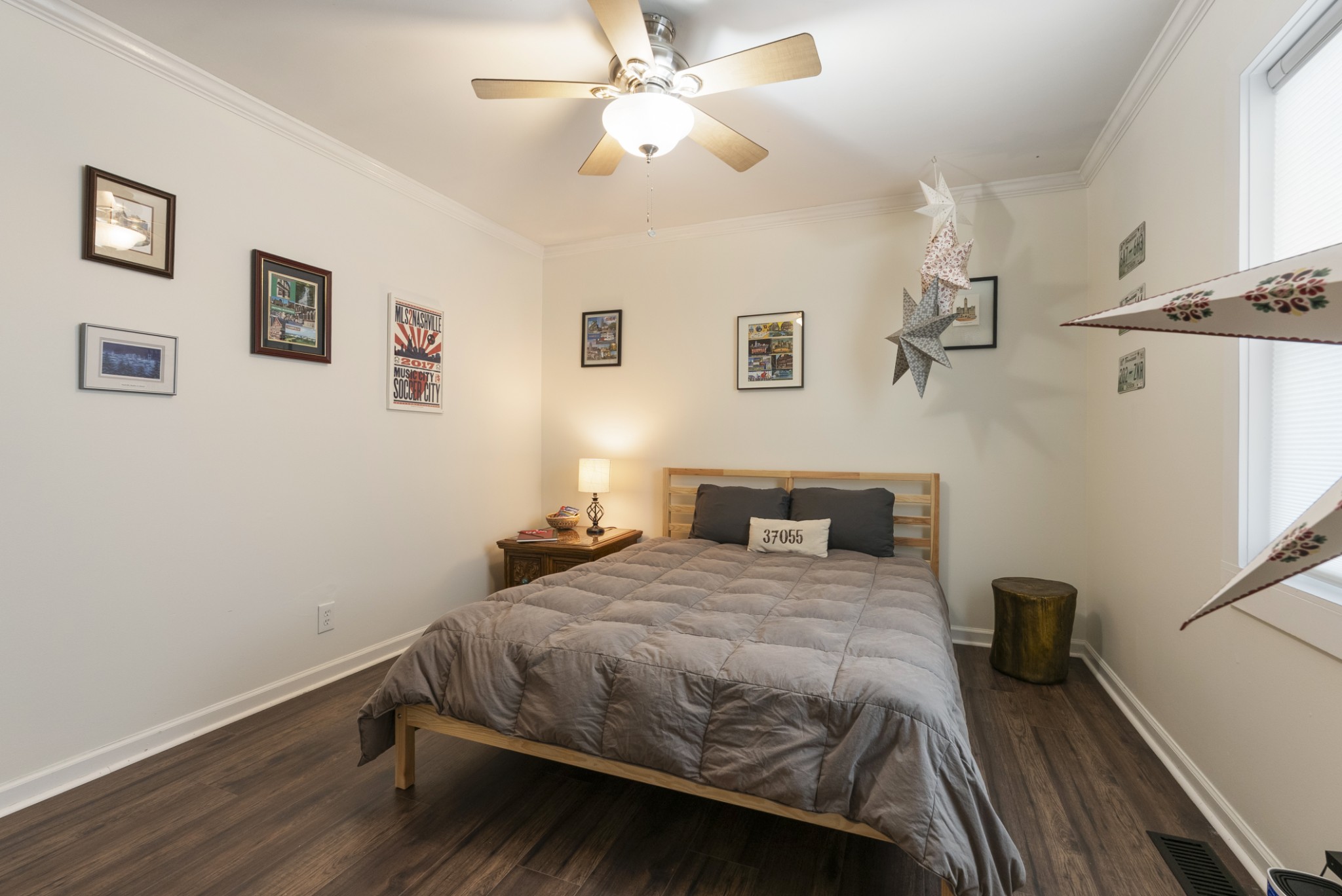 741 Fox Ridge Drive Brentwood, TN 37027 - Photo 31 of 38 a bedroom with a bed and a chandelier
