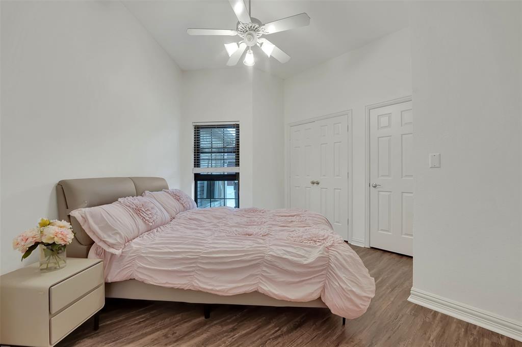 1690 Lynn Lane Lucas, TX 75002 - Photo 23 of 40 a bedroom with a bed and a couch