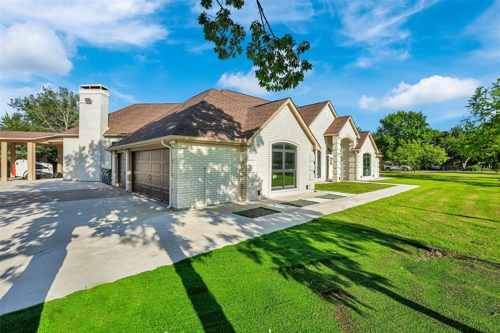 1690 Lynn Lane Lucas, TX 75002 - Photo 3 of 40 a front view of a house with yard and green space