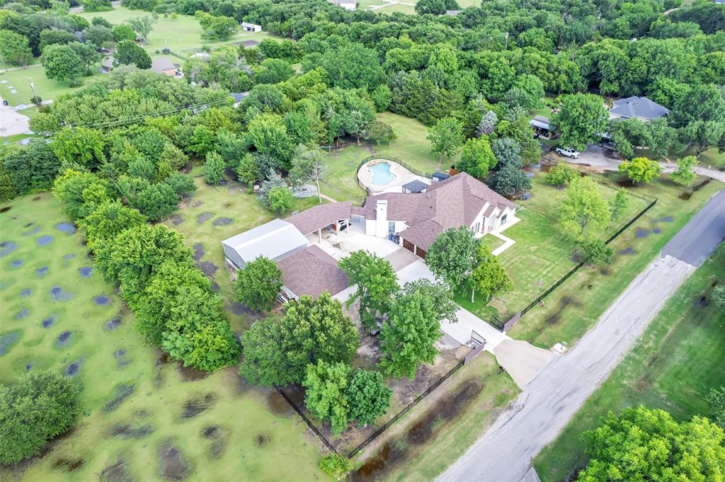 1690 Lynn Lane Lucas, TX 75002 - Photo 39 of 40 an aerial view of residential house with outdoor space and trees all around