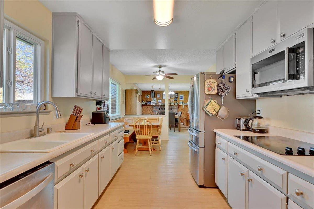 1741 U Street Elverta, CA 95626 - Photo 20 of 33 a large white kitchen with lots of counter space sink and appliances