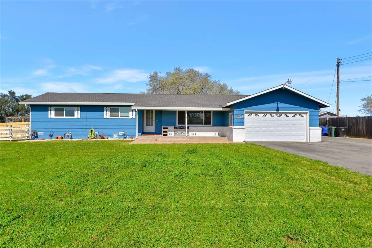 1741 U Street Elverta, CA 95626 - Photo 2 of 33 a view of a house with a yard