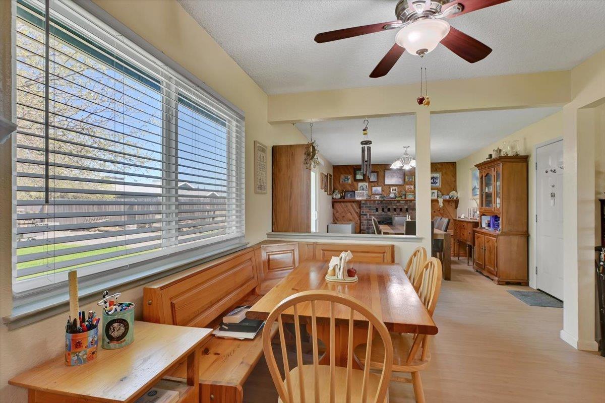 1741 U Street Elverta, CA 95626 - Photo 22 of 33 a view of a dining room with furniture and a chandelier