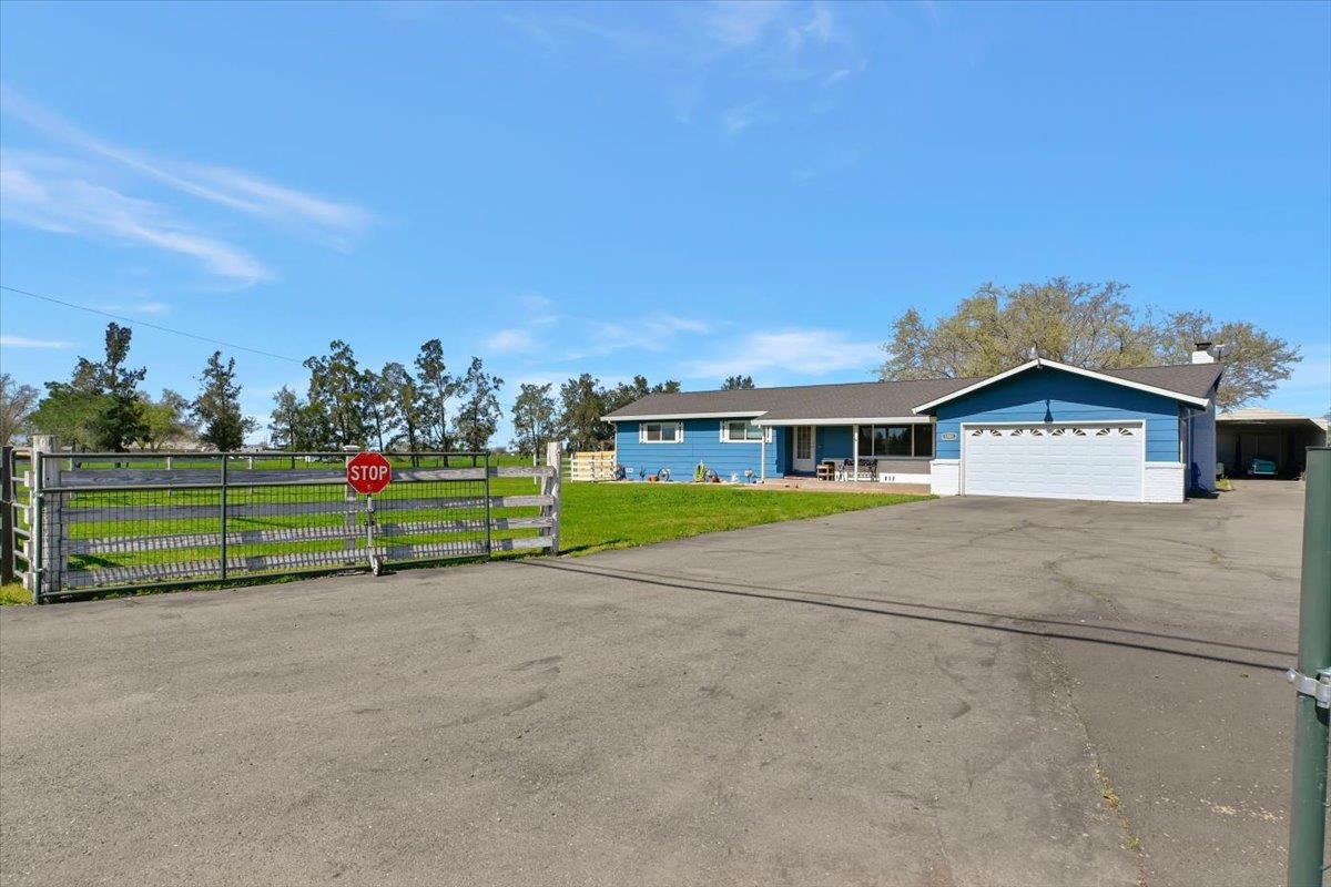 1741 U Street Elverta, CA 95626 - Photo 3 of 33 a view of a house with a big yard