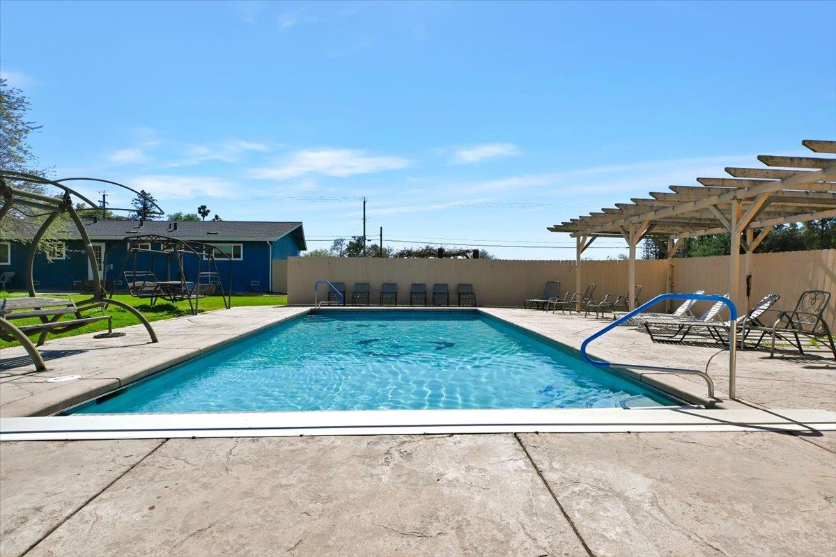1741 U Street Elverta, CA 95626 - Photo 5 of 33 a view of a terrace with a bench and lake view