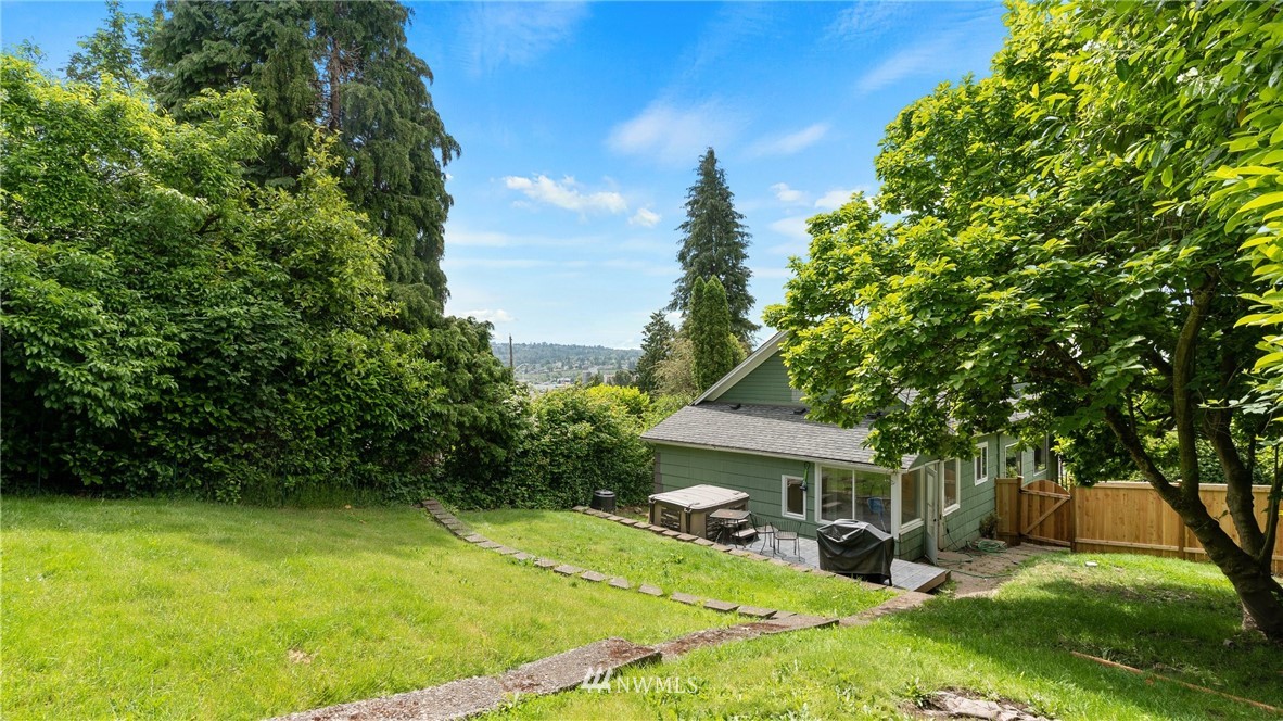 508 Southwest 3rd Place Renton, WA 98057 - Photo 21 of 23 a view of a house with a big yard plants and large trees