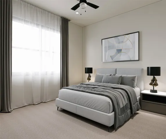 a bedroom with a bed and a painting on the wall