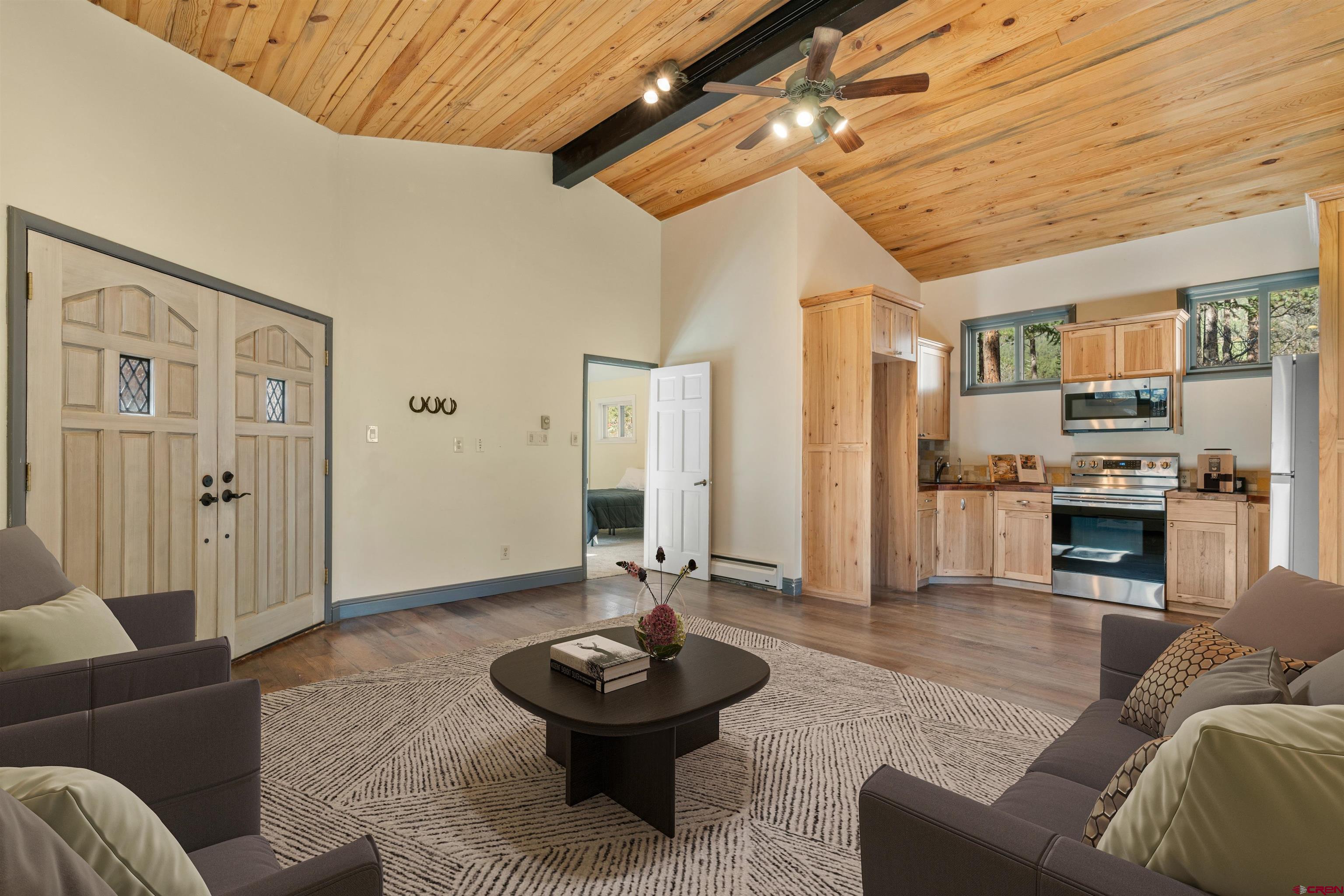 12199 County Road 240 Durango, CO 81301 - Photo 26 of 35 a living room with furniture and wooden floor