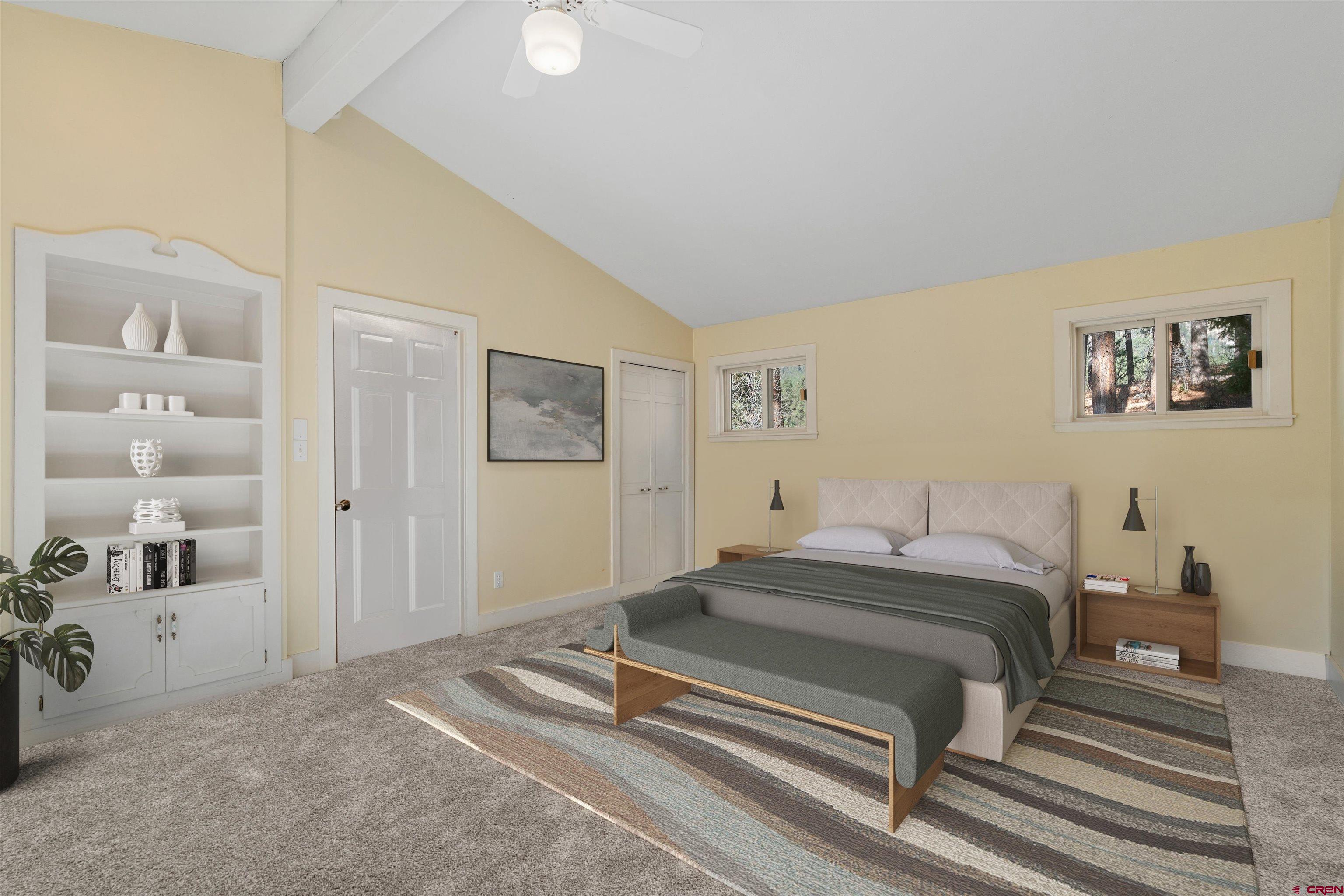 12199 County Road 240 Durango, CO 81301 - Photo 30 of 35 a bedroom with a bed and a cabinets