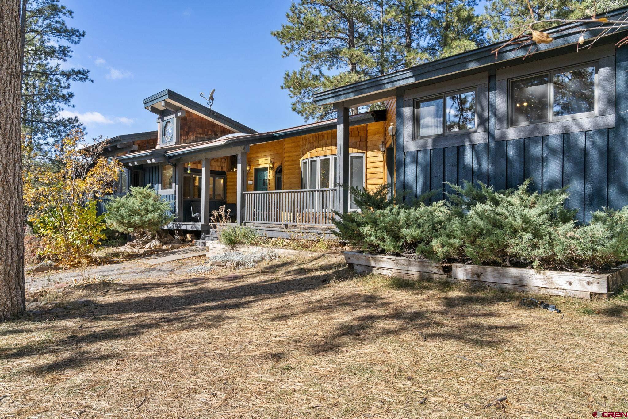 12199 County Road 240 Durango, CO 81301 - Photo 33 of 35 a front view of a house with garden