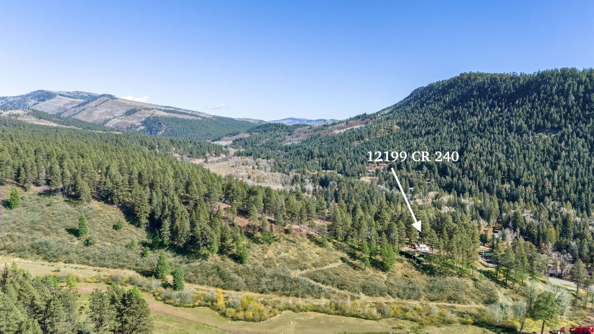 12199 County Road 240 Durango, CO 81301 - Photo 34 of 35 a view of a city with a mountain in the background