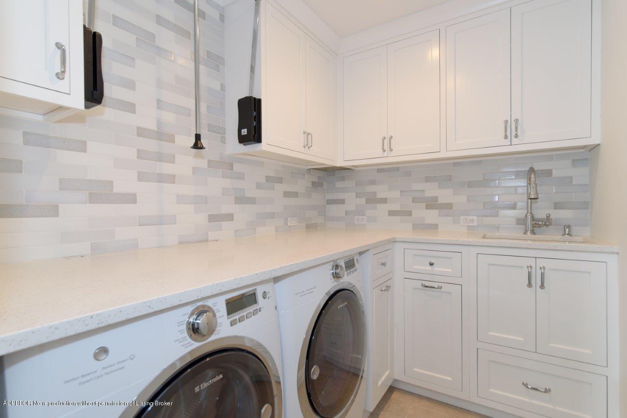 211 Caribbean Road Palm Beach, FL 33480 - Photo 21 of 24 Utility Room