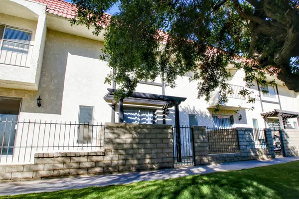 front view of a house with a small yard